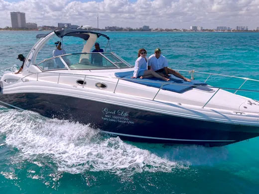 Guests aboard a private luxury yacht in Cancun